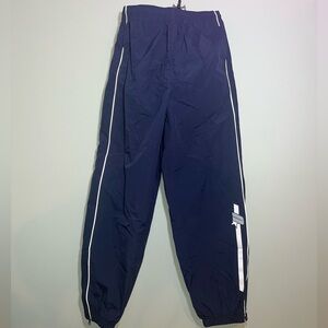 UO retro nylon track pants